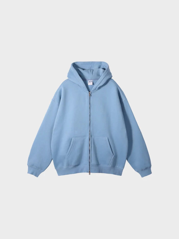 sweat zippé molleton bleu clair porté vue de face
