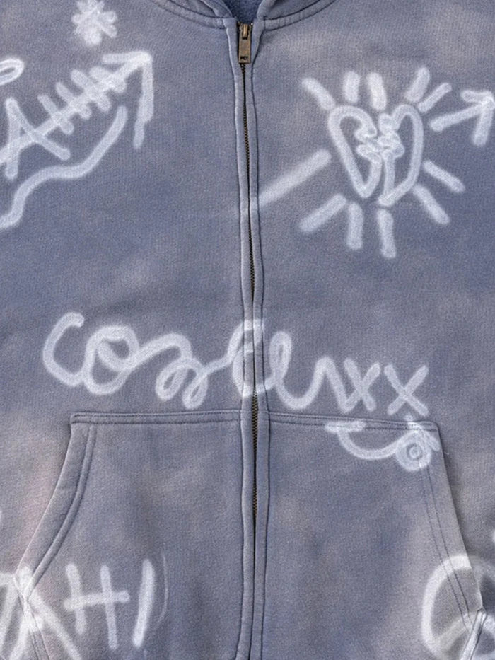 sweat zippé délavé graffiti détail matière et coutures